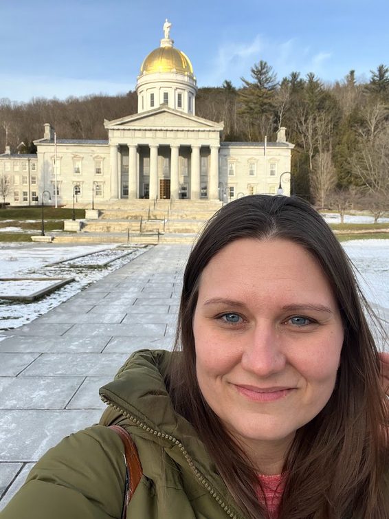 Jessica standing outside the State House on her first day back in the building! 